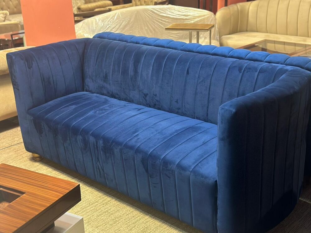 Navy velvet channel-tufted three seater sofa
