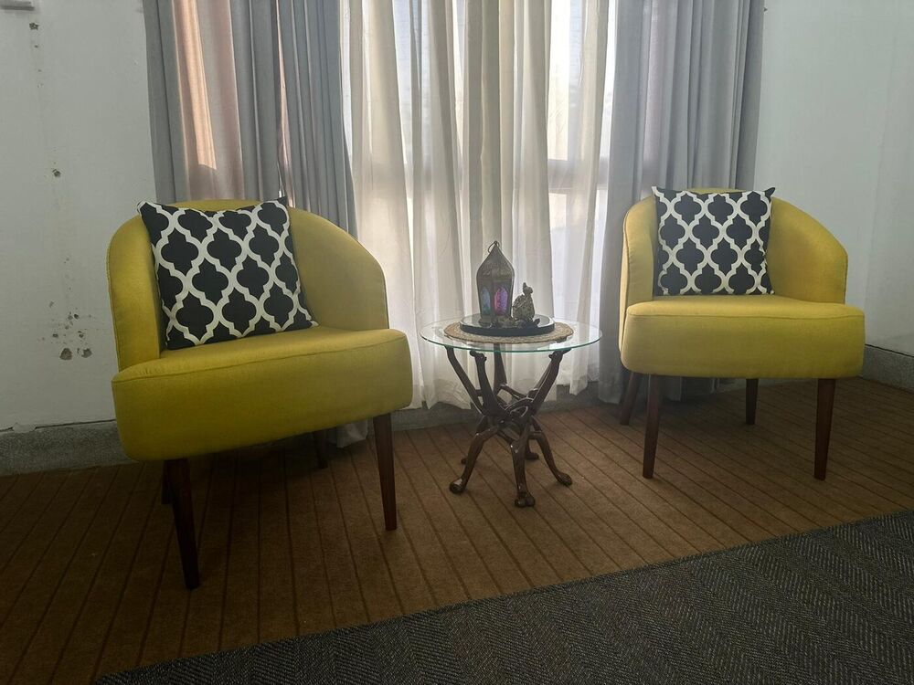 Pair of olive upholstered tub chairs