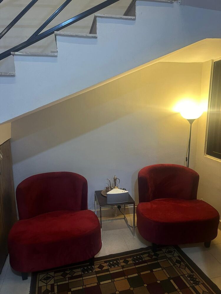 Pair of deep red velvet tub chairs